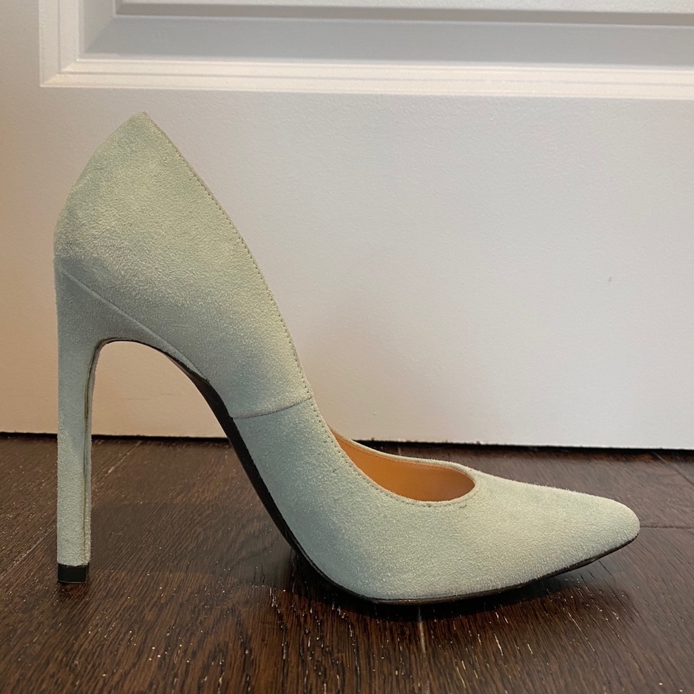 Stuart Weitzman mint suede pumps.